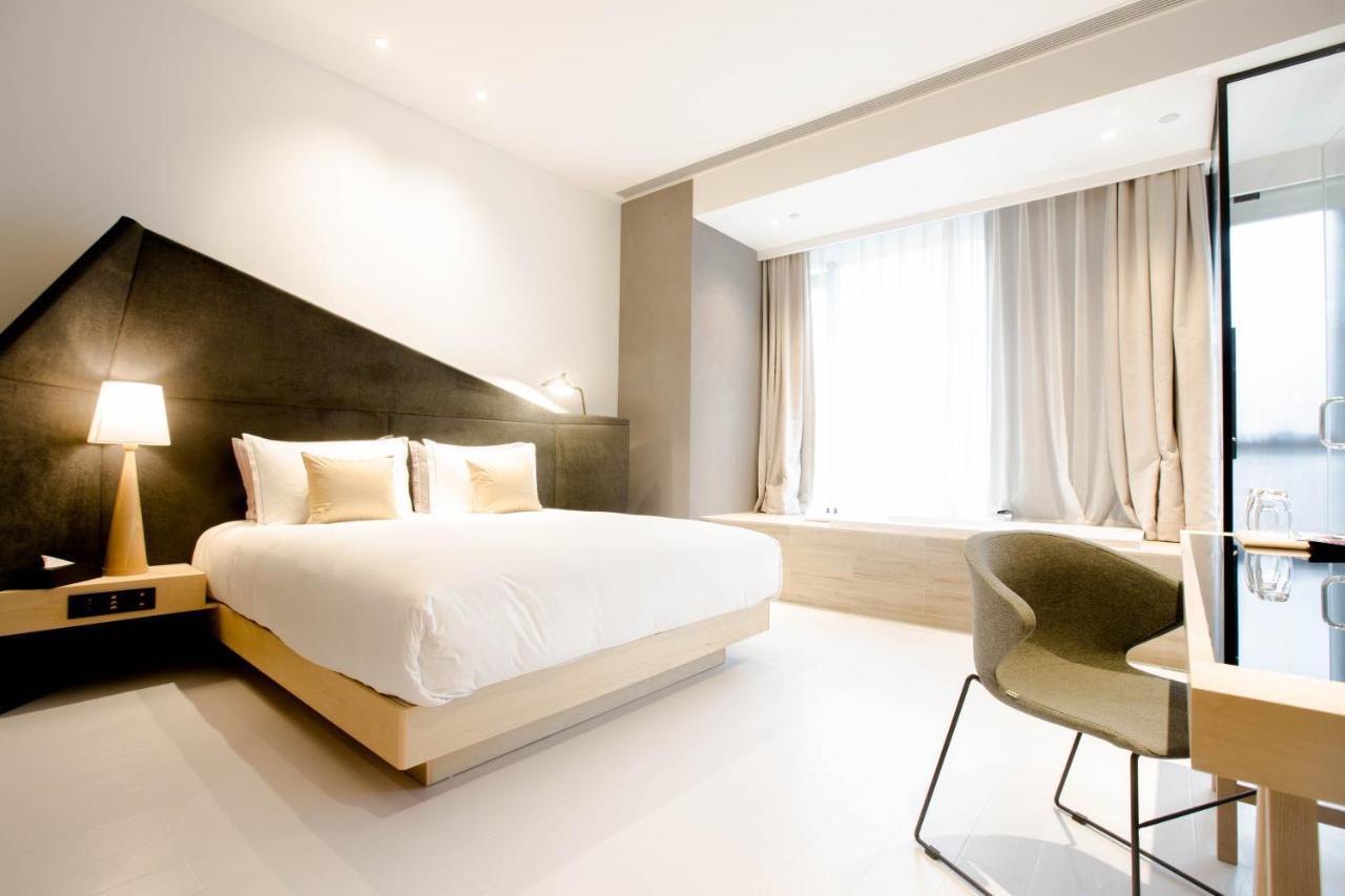 Wheat Hotel Ningbo Esterno foto