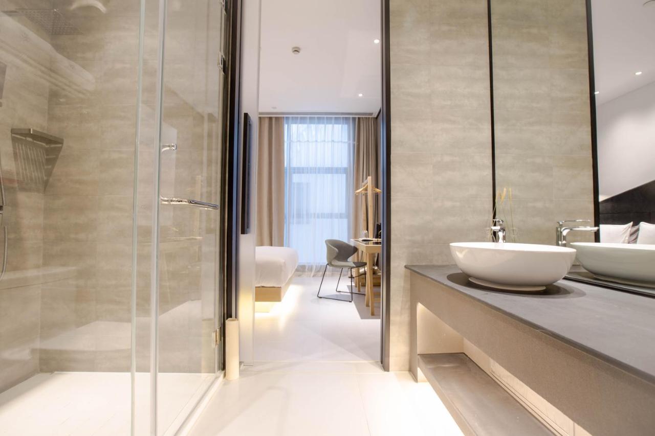 Wheat Hotel Ningbo Esterno foto