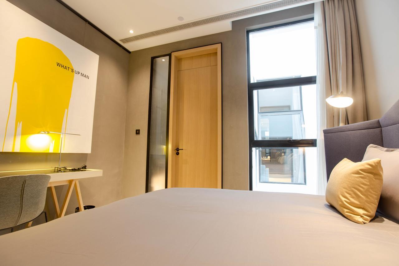 Wheat Hotel Ningbo Esterno foto