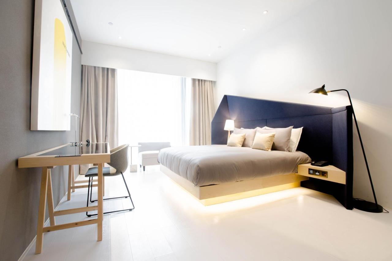 Wheat Hotel Ningbo Esterno foto