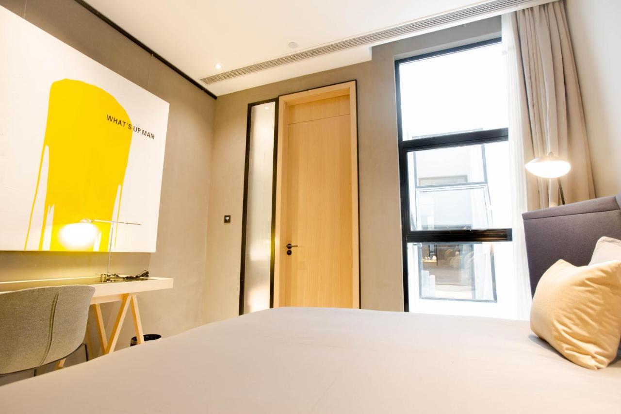Wheat Hotel Ningbo Esterno foto